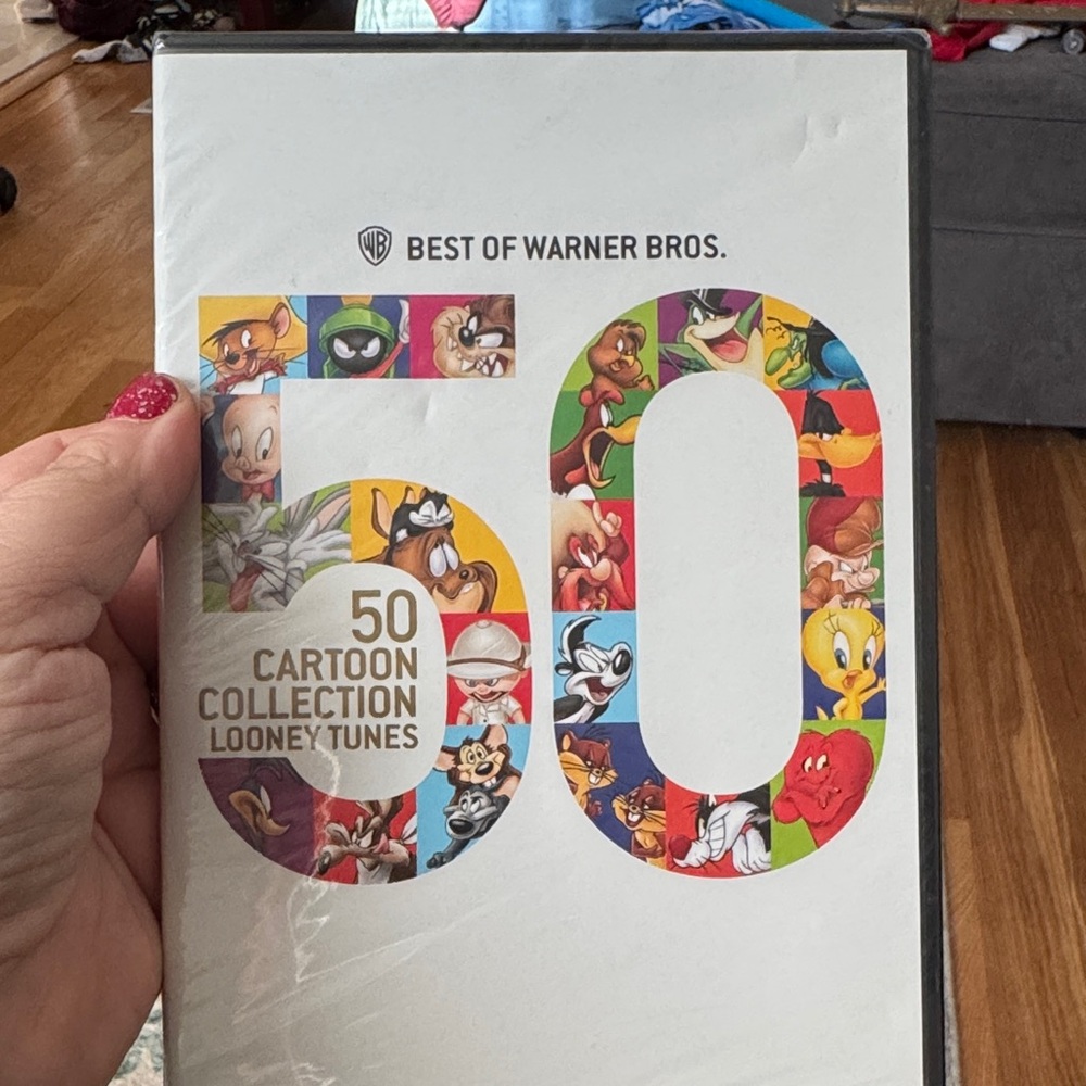 Warner Bros. White Case with Multicolor Looney Tunes 50 Cartoon Collection